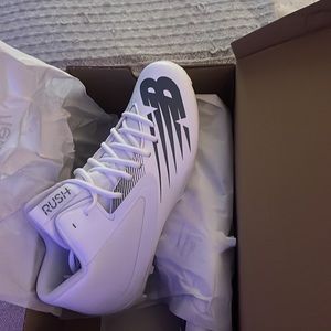 Never worn New Balance women’s lacrosse cleats! Size 9.